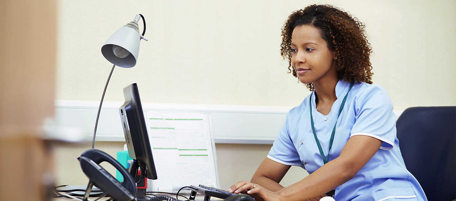 Nurse working on computer