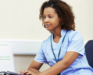 Nurse working on computer