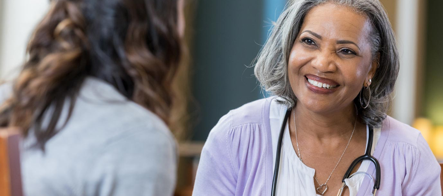 Nurse mentoring a younger colleague