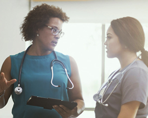 Head nurse speaking to a team