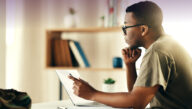 Veteran studying at a laptop