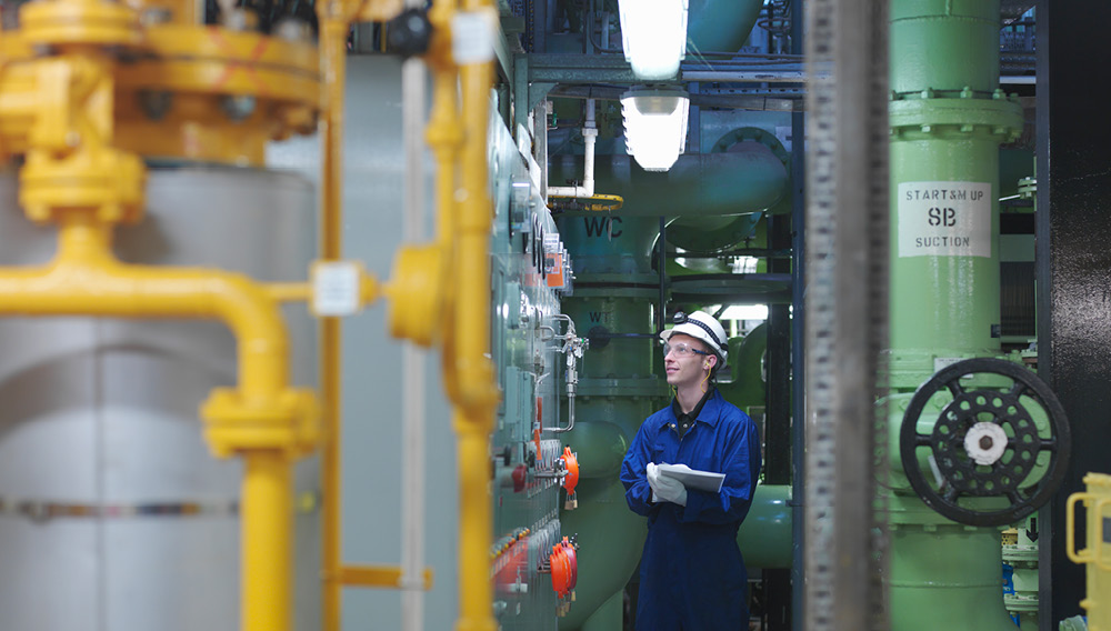 Nuclear technician checking safety gauges