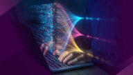 Hands above keyboard with graphic illustration of pixelated screen connected to light fibers above